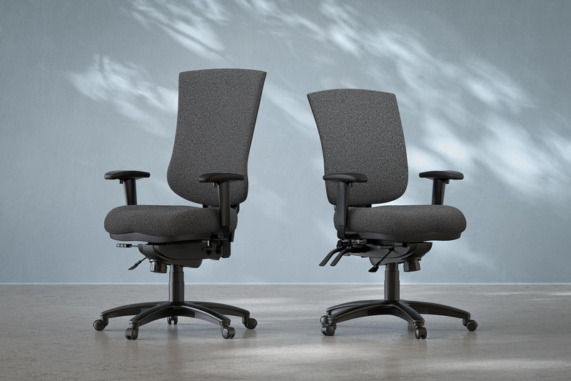 Drone Executive Mid-Back Chair in a charcoal fabric office setting