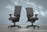 Drone Executive Mid-Back Chair in a charcoal fabric office setting