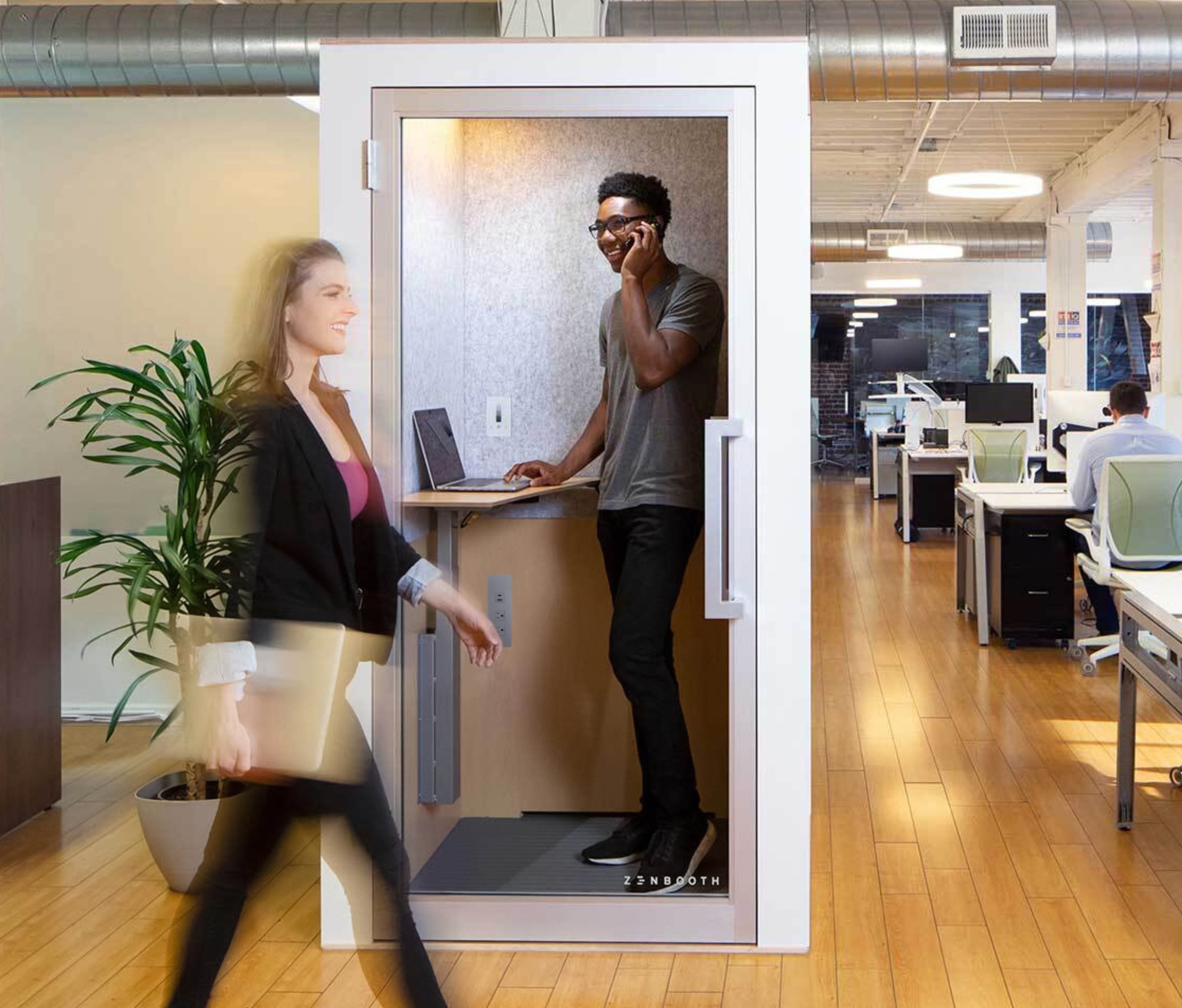 Zenbooth Solo white single-person office phone booth in a coworking space